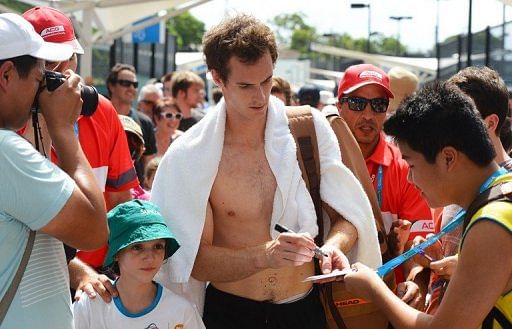 Andy Murray signs autographs after a training session in Brisbane, on January 1, 2013